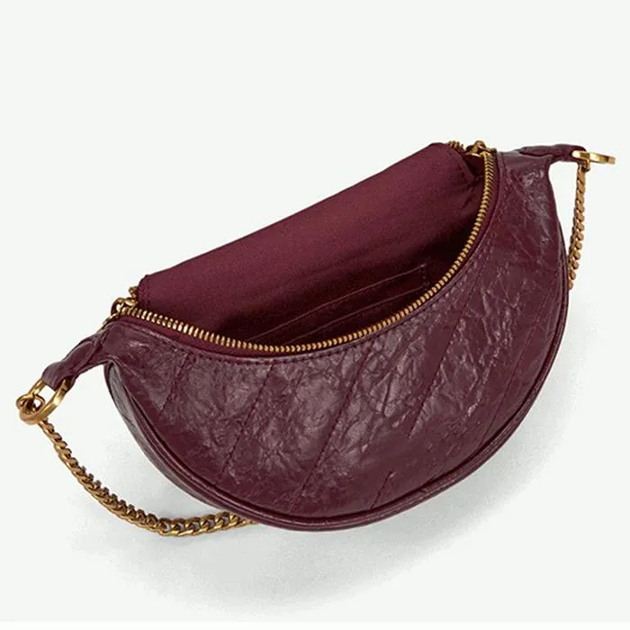 Túi Đeo Vai Nữ Charles & Keith CNK Wrinkled Patent Ring Zip Tassel Crossbody Bag CK2-80150844 Màu Đỏ Mận