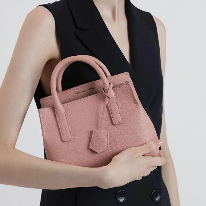 Túi Xách Tay Nữ Charles & Keith CNK Tuck-In Flap Structured CK2-30270316-1 Màu Hồng