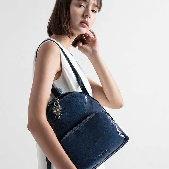 Balo Nữ Charles & Keith CNK Robot Charm Wrinkled Patent Backpack Xanh Navy