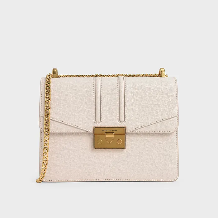 Túi Xách Nữ Charles & Keith CNK Metallic Push-Lock Shoulder Bag CK2-21200009-5 Màu Hồng Nhạt