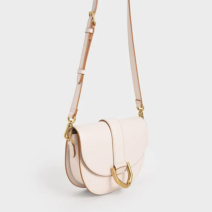 Túi Xách Nữ Charles & Keith CNK Gabine Saddle Bag 80781412 Pink Màu Hồng Nhạt Size 23cm
