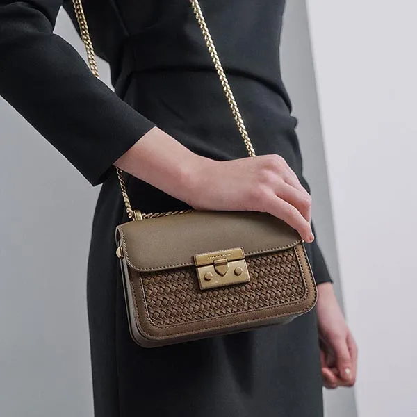 Túi Đeo Chéo Nữ Charles & Keith CNK Woven Push-Lock Crossbody Bag CK2-80701088-4 Màu Kaki
