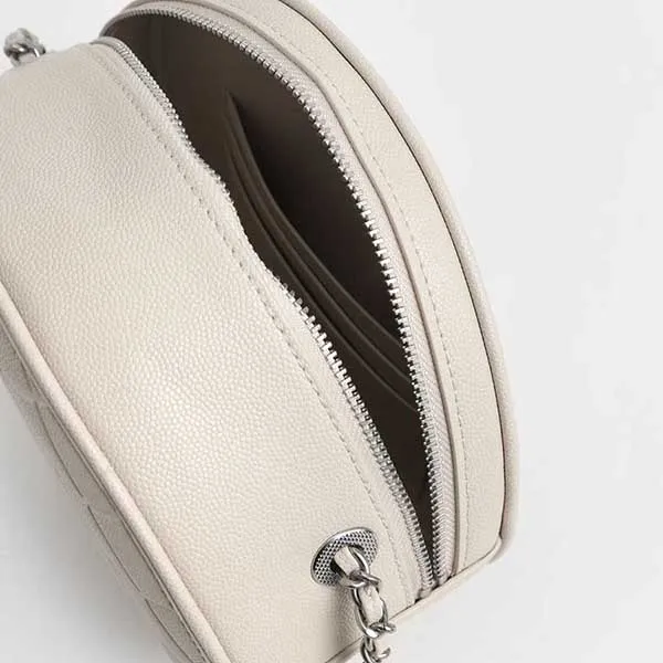 Túi Đeo Chéo Nữ Charles & Keith CNK Quilted Circle Bag Cream CK2-80680915