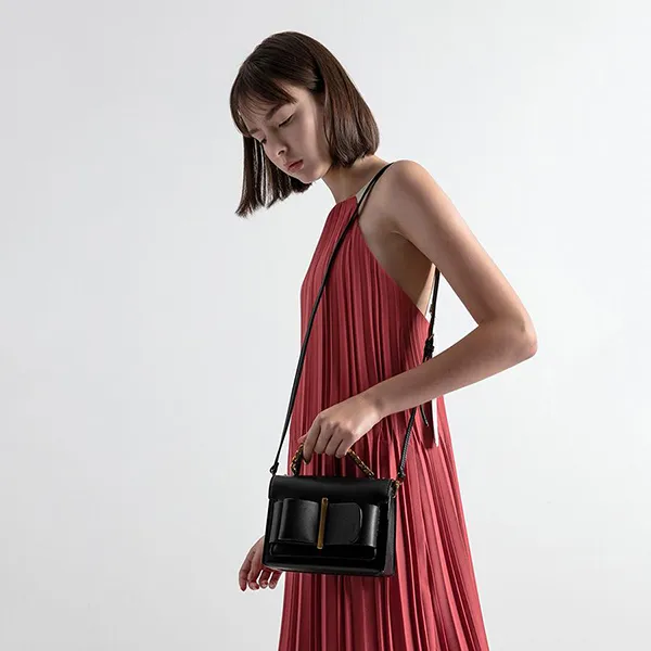 Túi Cầm Tay Nữ Charles & Keith CNK Chunky Metal Top Handle Bow Flap Bag CK2-50680795-1 Màu Đen