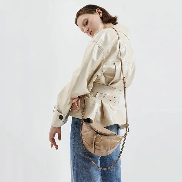 Túi Đeo Vai Nữ Charles & Keith CNK Wrinkled Patent Ring Zip Tassel Crossbody Bag 80150844 Màu Be