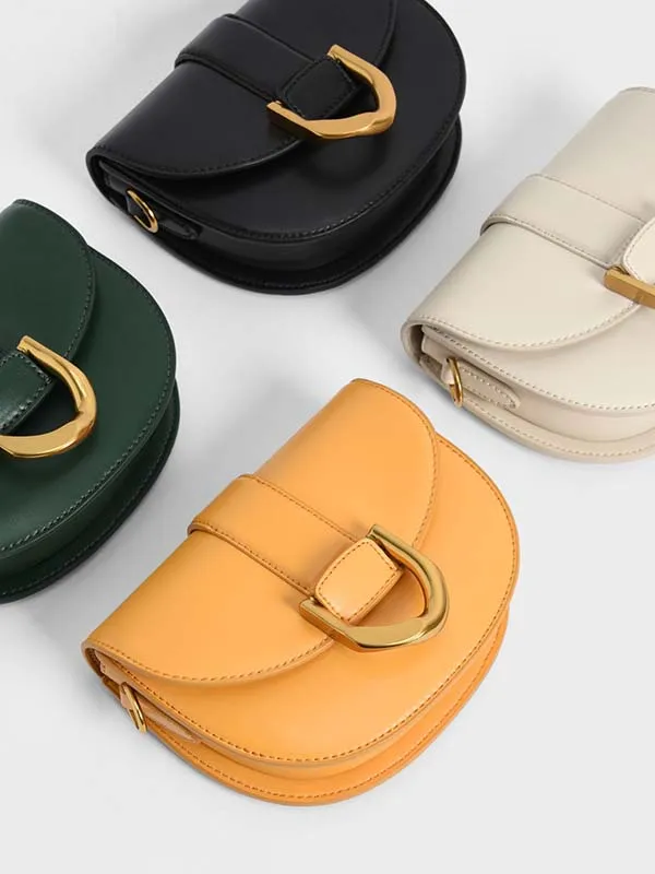 Túi Đeo Vai Nữ Charles & Keith CNK Metallic Buckle Saddle Bag Màu Đen Size 18cm