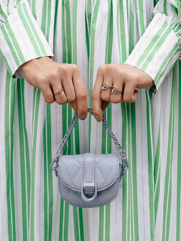 Túi Xách Nữ Charles & Keith CNK Micro Gabine Quilted Saddle Bag​- Steel Blue Màu Xanh Blue