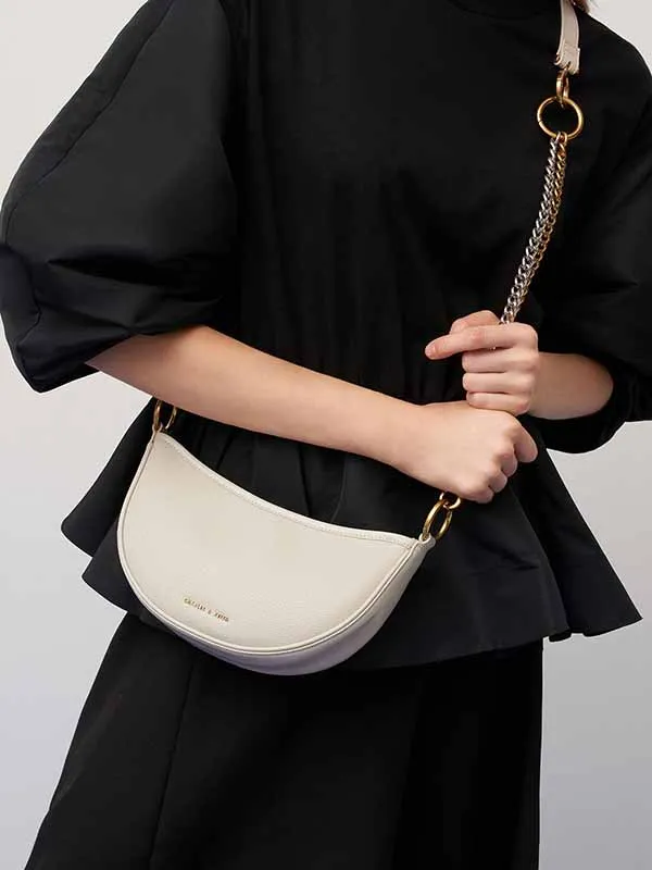 Túi Xách Nữ Charles & Keith CNK Crescent Crossbody Bag Ivory 80781582 Màu Trắng