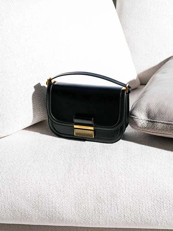 Túi Đeo Chéo Nữ Charles & Keith CNK Metallic Push-Lock Crossbody Bag CK2-80781599-1 Màu Đen