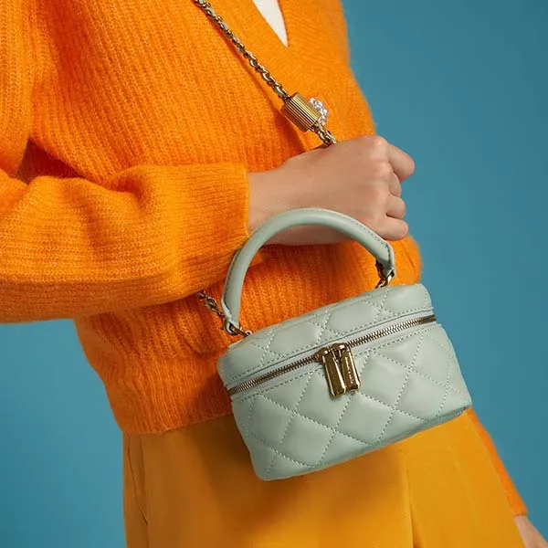 Túi Xách Nữ Charles & Keith CNK Quilted Round Pouch CK6-30781682 Màu Xanh Ngọc