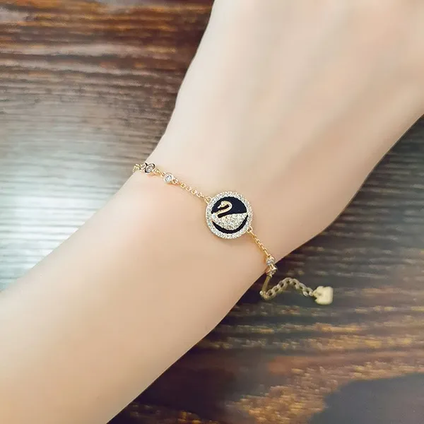 Vòng Đeo Tay Swarovski Leather Swan Gold Tone And White Cubic Zirconia Bracelet 5376481 Màu Vàng