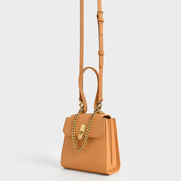 Túi Xách Nữ Charles & Keith CNK Geometric Top Handle Chain-Link Bag 50270882-1 Màu Cam Nâu