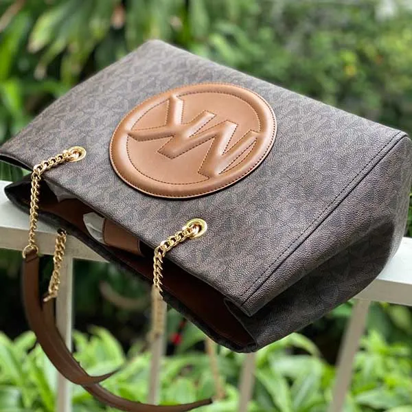Túi Đeo Vai Michael Kors MK Brynn Large Logo And Faux Leather Tote Bag Màu Nâu Đen