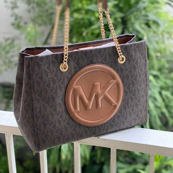 Túi Đeo Vai Michael Kors MK Brynn Large Logo And Faux Leather Tote Bag Màu Nâu Đen