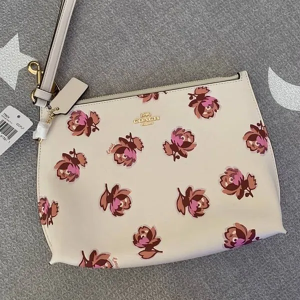 Túi Cầm Tay Coach Clutch Charlie Pouch 79824 Màu Trắng Họa Tiết