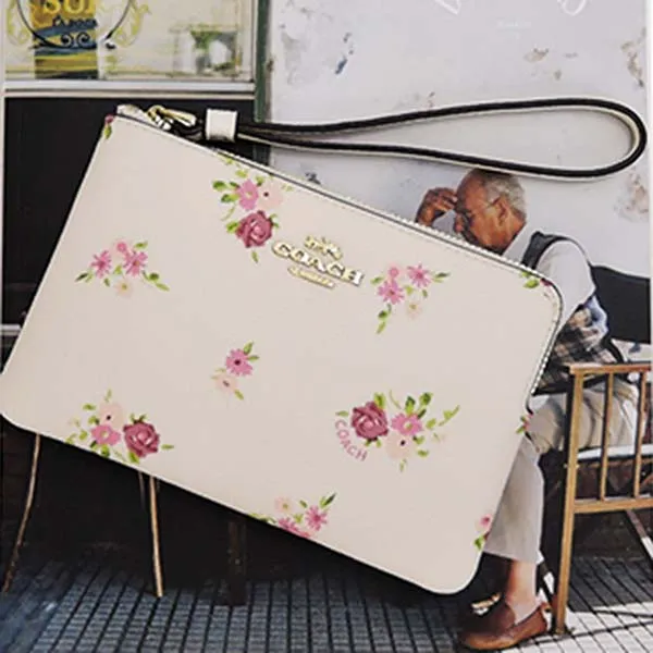 Túi Cầm Tay Coach Floral Wristlet Wallet Màu Trắng Họa Tiết - Túi xách - Vua Hàng Hiệu