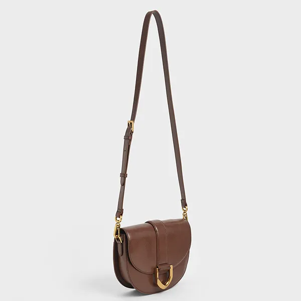 Túi Đeo Vai Nữ Charles & Keith CNK Gabine Saddle Bag - Dark Brown 80781610-1 Màu Nâu