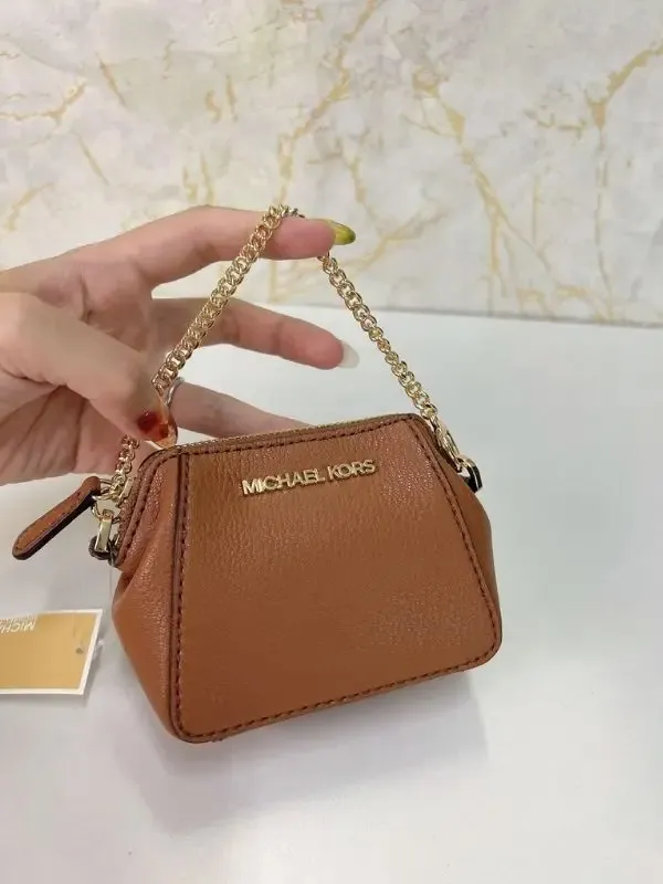 Ví Michael Kors MK Charlotte Small Pouch Key Fob Luggage Màu Nâu