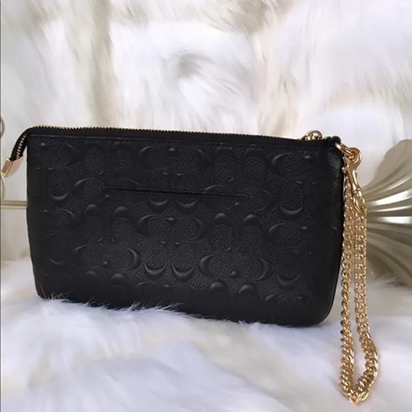 Túi Cầm Tay Clutch Coach Large Wristlet In Signature Leather F76763 Màu Đen