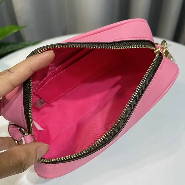 Túi Cầm Tay Coach Jamie Wristlet In Signature Canvas With Varsity Motif Màu Nâu Đỏ