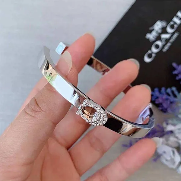 Vòng Đeo Tay Coach Pave Signature Hinged Bangle 91428 Màu Bạc