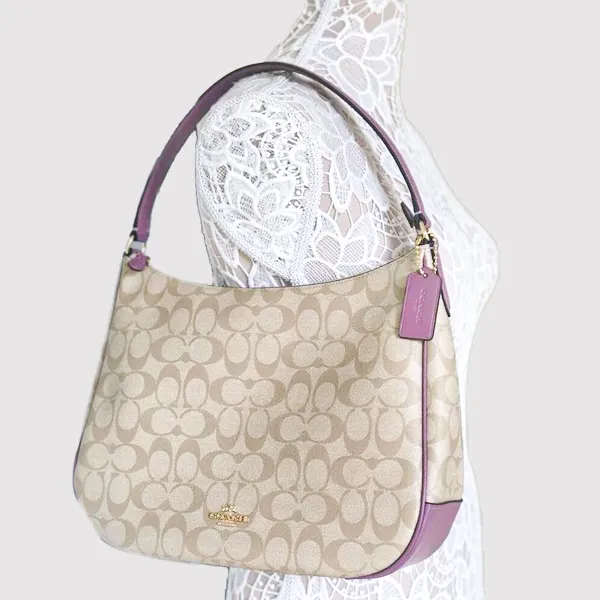 Túi Xách Coach Signature Canvas Leather Zip F29209 Màu Nâu Trắng