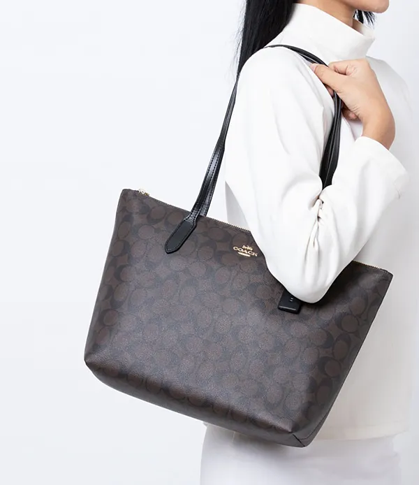Túi Coach Zip Top Toe In Signature Canvas 4455 Màu Nâu Đen