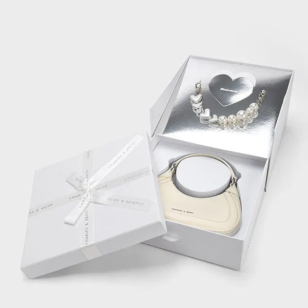 Túi Xách Nữ Charles & Keith CNK Mini Hobo Bag 80782142 Màu Trắng Kem