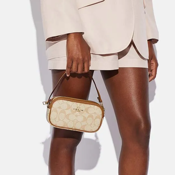 Túi Cầm Tay Coach Jamie Wristlet In Signature Canvas CA718 Màu Vàng Nâu