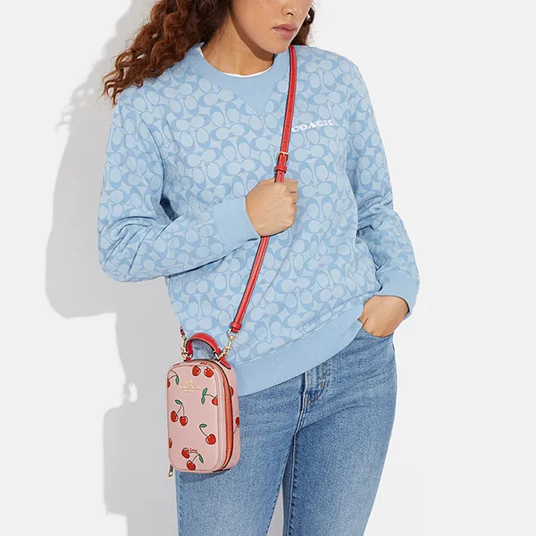 Túi Đeo Chéo Coach Eva Phone Crossbody With Heart Cherry Print CF371 Màu Hồng/Đỏ