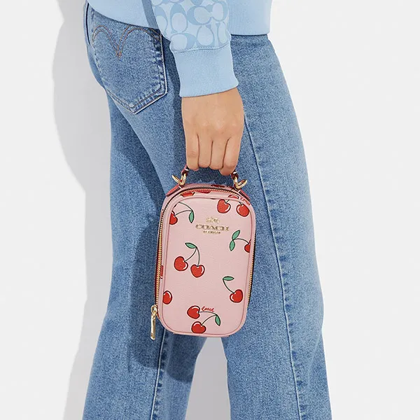 Túi Đeo Chéo Coach Eva Phone Crossbody With Heart Cherry Print CF371 Màu Hồng/Đỏ