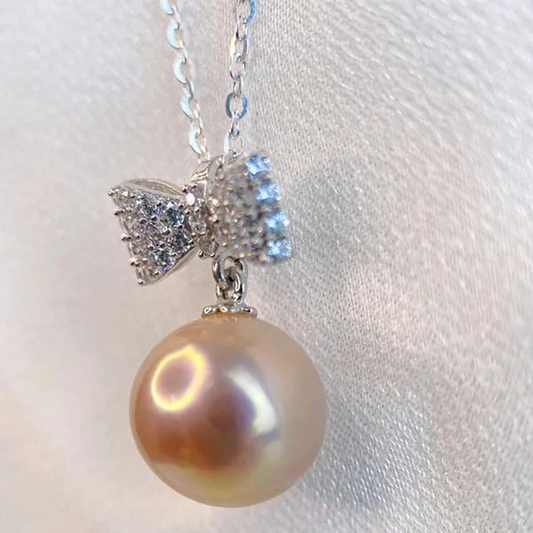 Mặt Dây Chuyền Nữ Minh Hà Pearl Jewelry Ngọc Trai Và Hình Nơ Màu Bạc