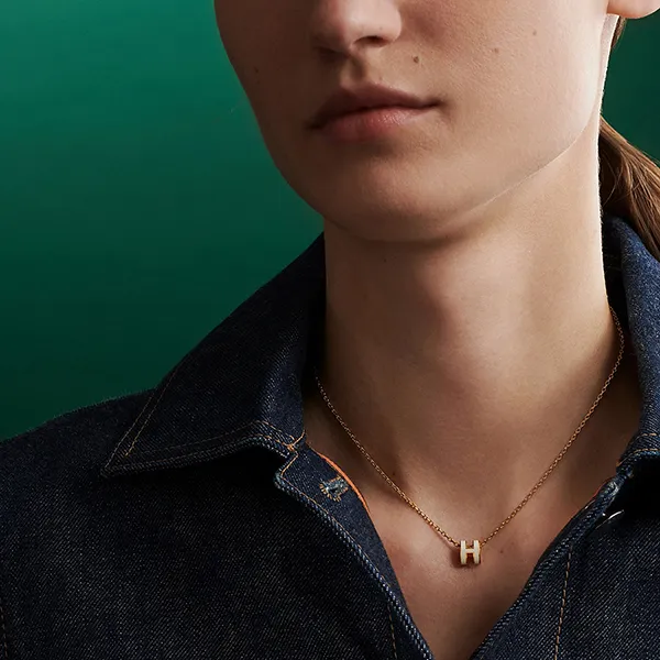 Dây Chuyền Nữ Hermès Mini Pop H Pendant Màu Vàng Mặt Trắng
