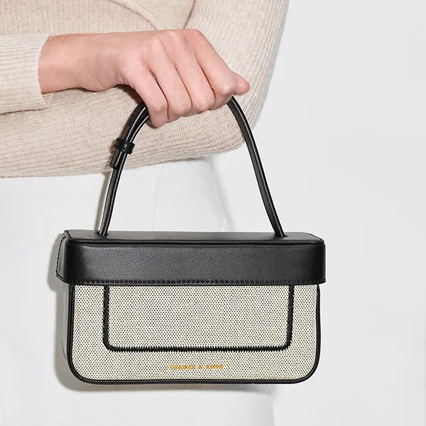 Túi Xách Tay Nữ Charles & Keith CNK Astra Canvas Contrast Trim Boxy Bag Black Textured 50701286 Màu Đen Phối Trắng