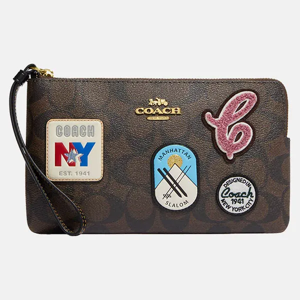Túi Cầm Tay Coach Large Corner Zip Wristlet In Signature Canvas With Ski Patches CF457 Màu Nâu Đen