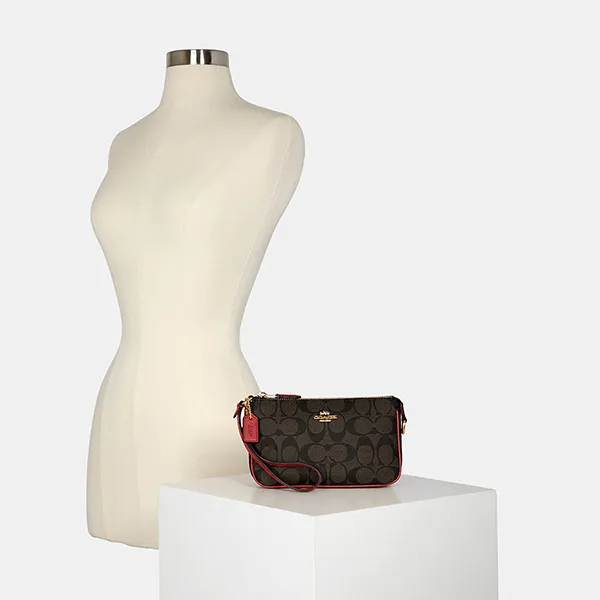Túi Xách Tay Nữ Coach Nolita 19 In Signature Canvas C3308 Màu Nâu Đậm