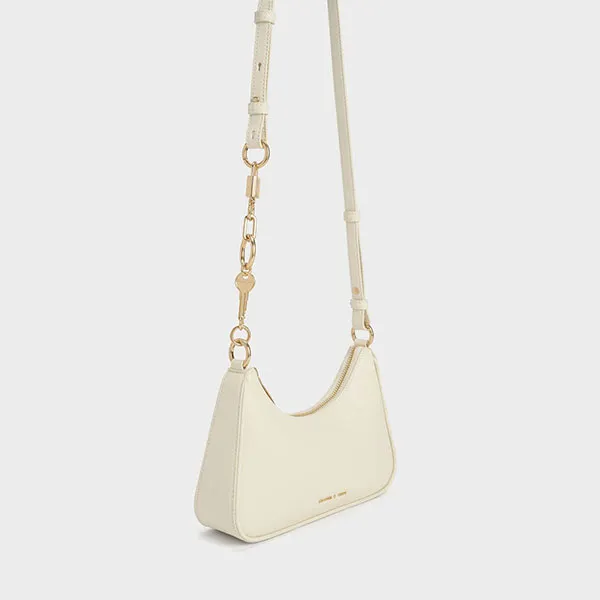 Túi Đeo Vai Nữ Charles & Keith CNK Lock & Key Chain Handle Trapeze Bag 20271269 Màu Cream