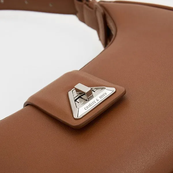 Túi Xách Nữ Charles & Keith CNK Trice Metallic Accent Belted Shoulder Bag Cognac 50271205 Màu Nâu