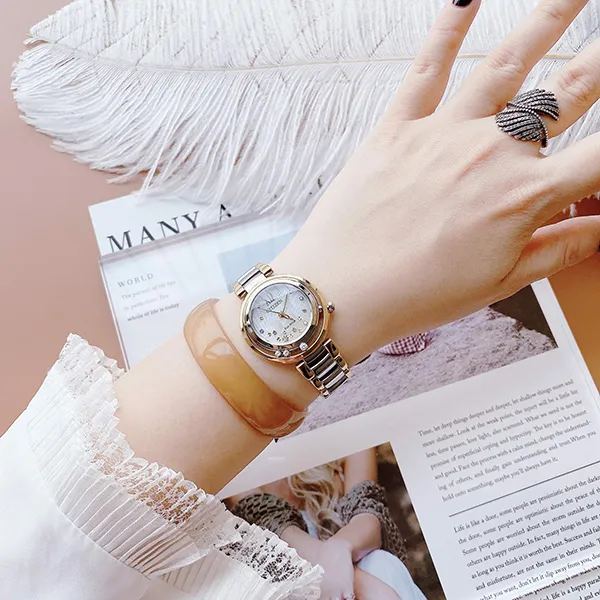 Đồng Hồ Nữ Citizen Eco-Drive Sunrise Diamond EM0324-58D Màu Bạc Vàng