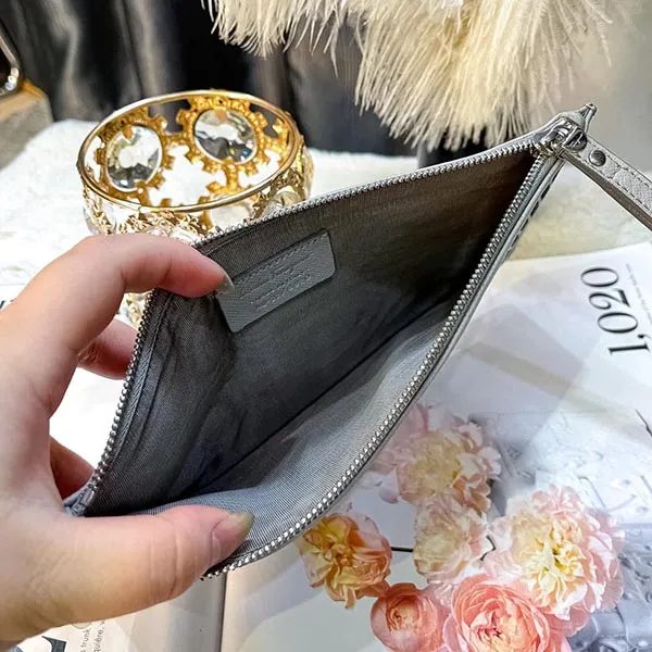 Túi Cầm Tay Nữ Salvatore Ferragamo Laser Cut Zip Pouch SAL01693A Màu Xám Bạc - Túi xách - Vua Hàng Hiệu