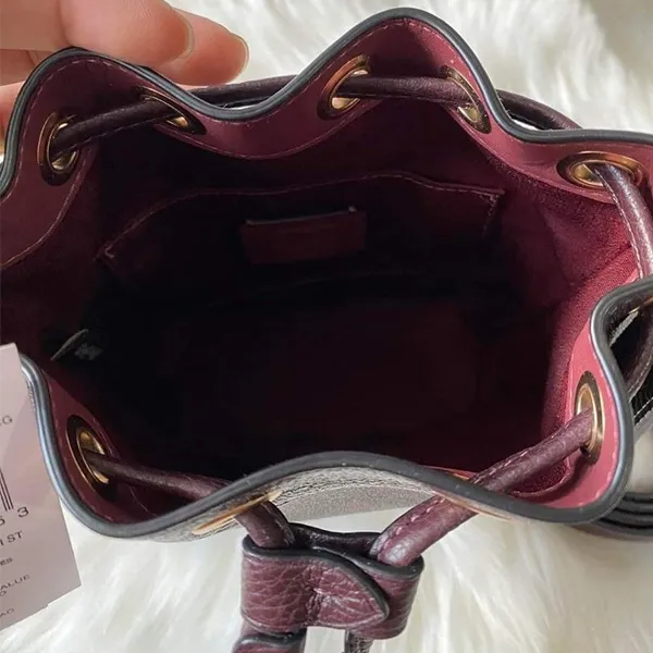Túi Đeo Chéo Nữ Coach Dempsey Drawstring Bucket Bag Màu Đỏ Nâu