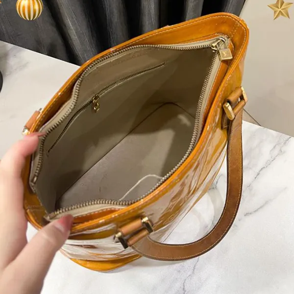 Túi Tote Nữ Louis Vuitton LV Houston Monogram Vernis Bag M91121 Màu Vàng Nghệ