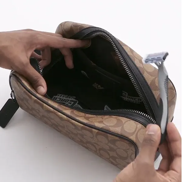 Túi Cầm Tay Nam Coach Large Travel Kit In Signature Canvas 2706 Màu Nâu