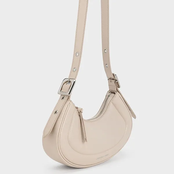Túi Đeo Vai Nữ Charles & Keith CNK Petra Curved Shoulder Bag Oat 20271258 Màu Be Nhạt
