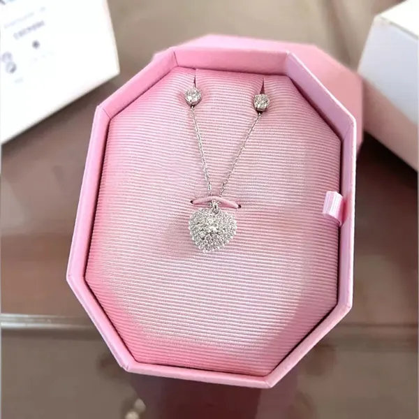 Set Dây Chuyền Và Khuyên Tai Nữ Swarovski Heart Hyperbola Jewelry Màu Trắng Bạc