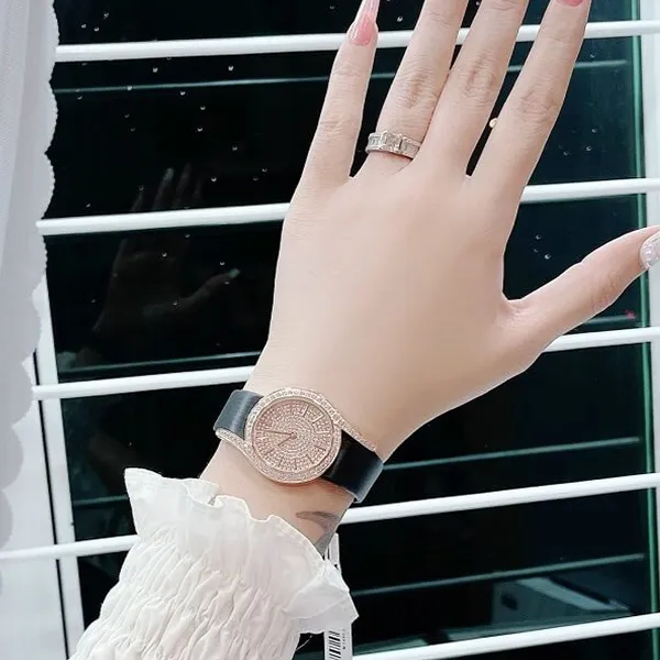 Đồng Hồ Nữ X-Cer Quartz Rose Gold Dial B0632 Màu Đen Vàng Hồng