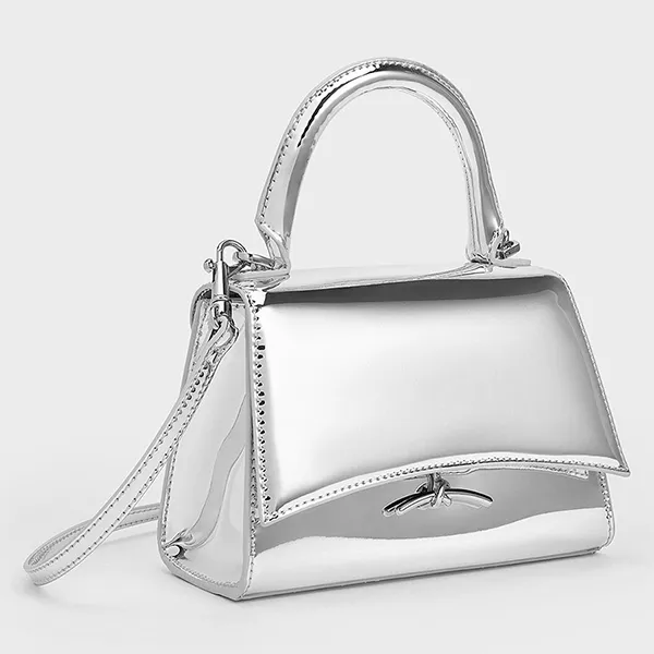Túi Đeo Chéo Nữ Charles & Keith CNK Huxley Metallic Push-Lock Top Handle Bag 50270807-A Màu Bạc