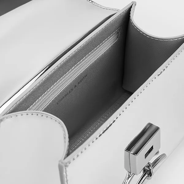 Túi Đeo Chéo Nữ Charles & Keith CNK Huxley Metallic Push-Lock Top Handle Bag 50270807-A Màu Bạc