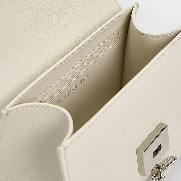 Túi Đeo Chéo Nữ Charles & Keith CNK Huxley Metallic Push-Lock Top Handle Bag 50270807-A Màu Trắng Kem