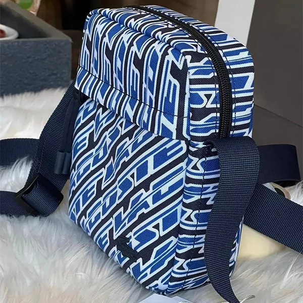 Túi Đeo Chéo Nam Lacoste Men's Neocroc Logo Print Vertical Messenger Bag NH4221NZ L63 Màu Xanh Phối Đen